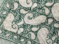 A quilt with a timeless design handprinted in the Green Paisley print. The quilt blanket can be used on top of a duvet or on a summer sheet for extra warmth.