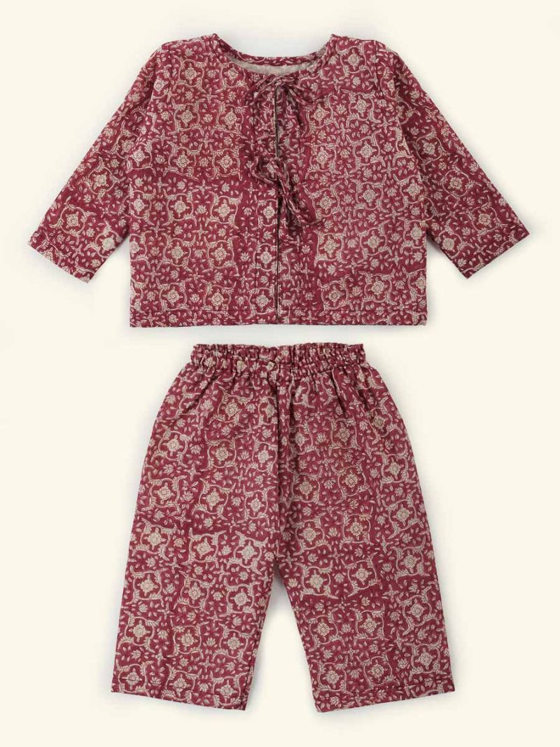 Newborn coming home outfit by Khasto a product of craftsmanship and sustainability. The baby going home outfit is hand block printed and quilted has an inner lining of our celebrated soft voile for an optimal wearing comfort.