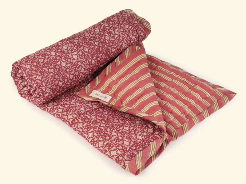 Organic blanket by Khasto a product of craftsmanship and sustainability. The blanket quilt is hand block printed and quilted
