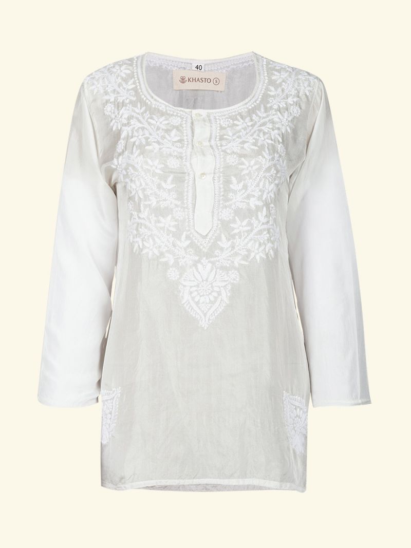 Silk short blouse by Khasto a product of craftsmanship and sustainability. The women Silk short blouse white is hand block printed and has an inner lining of our celebrated soft voile for an optimal wearing comfort.